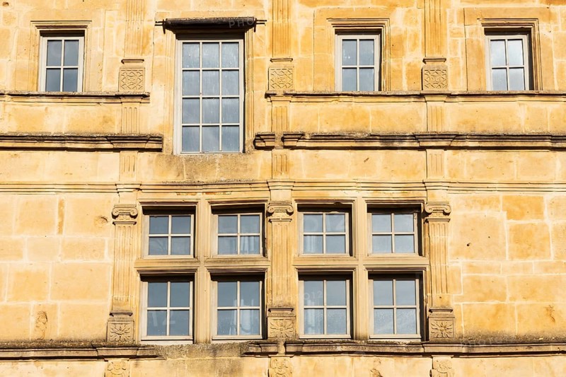 Window, historic house facade, yellow sandstone, Marville, Renaissance village, Département Meuse, Grand Est, France