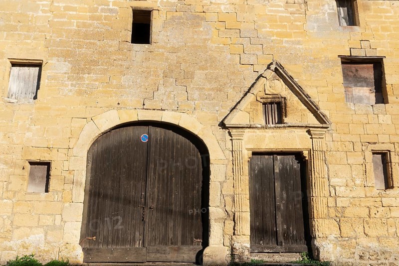 Wooden door, window, historic house facade, yellow sandstone, Marville, Renaissance village, Département Meuse, Grand Est, France