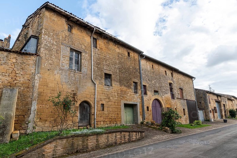 Abandoned street with historic house facades, yellow sandstone, Marville, Renaissance village, Département Meuse, Grand Est, France