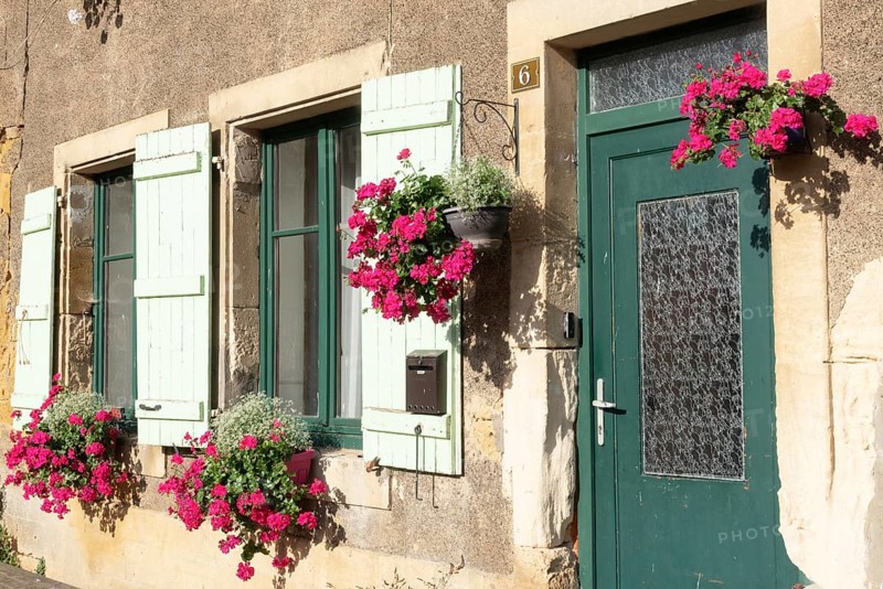 Entrance decorated with flowers, Marville, Renaissance village, Département Meuse, Grand Est, France