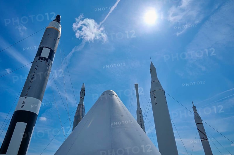 Rockets under bright sunshine, with a cloud in the blue sky, Kennedy Space Centre Visitor Complex, Merritt Island, Florida, USA