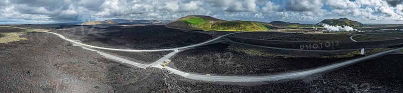 Lava, lava field, road, destroyed, summer, cloudy, sunny, panorama, aerial view Blue Lagoon, Sundhnúkur crater series, Fagradalsfjall, Reykjanes, Iceland