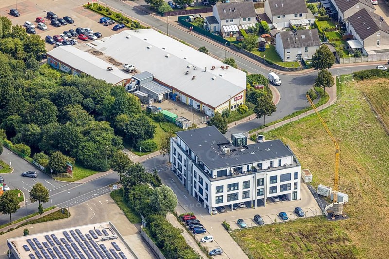 Aerial view, Rewe supermarket in Bergkamen, Ruhr area, North Rhine-Westphalia, Germany, Bergkamen, DE, shopping markets, shopping centre, Europe, aerial view, aerial photography, aerial photography, local supply centre, supermarket, overview, bird's-eye view, overview