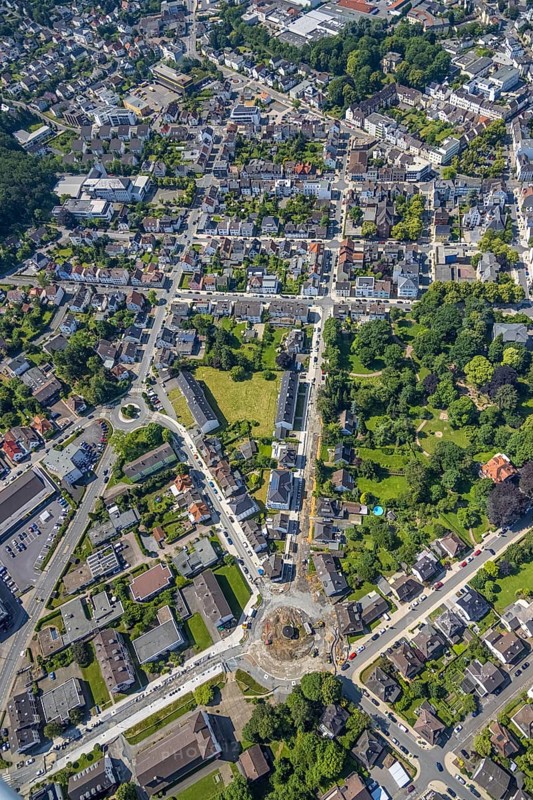 Aerial view, construction site and redesign of roundabout Pfarrer-Leo-Reiners-Platz, formerly Ehmsenplatz, Alter Holzweg, catholic St. Michael Church, Neheim, Arnsberg, Sauerland, North Rhine-Westphalia, Germany, place of worship, construction work, construction area, construction site, building plots, construction project, construction site, DE, Europe, religious community, place of worship, sacred site, Hochsauerlandkreis, church, church community, denomination, roundabout, roundabout, aerial view, aerial photography, aerial photography, religion, religious site, overview, bird's-eye view, birds-eyes view, overview