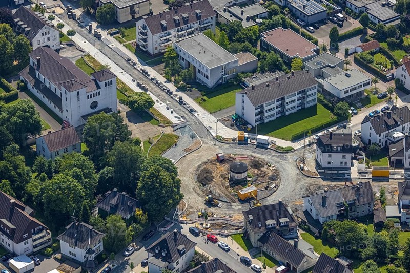 Aerial view, construction site and redesign of roundabout Pfarrer-Leo-Reiners-Platz, formerly Ehmsenplatz, Alter Holzweg, catholic St. Michael Church, Neheim, Arnsberg, Sauerland, North Rhine-Westphalia, Germany, place of worship, construction work, construction area, construction site, building plots, construction project, construction site, DE, Europe, religious community, place of worship, sacred site, Hochsauerlandkreis, church, church community, denomination, roundabout, roundabout, aerial view, aerial photography, aerial photography, religion, religious site, overview, bird's-eye view, birds-eyes view, overview