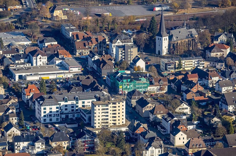 Aerial view, construction site at Heinrich-Lübke-Straße and St.Petri-Kirche in the district Hüsten in Arnsberg, Sauerland, North Rhine-Westphalia, Germany, place of worship, Arnsberg, construction work, construction area, building site, building plots, construction project, construction site, DE, Europe, religious community, place of worship, holy place, church, parish, denomination, aerial photograph, aerial photography, aerial photography, religion, religious site, overview, bird's eye view, birds-eyes view, overview