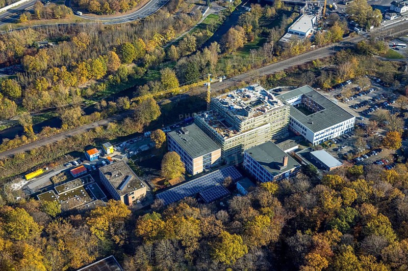 Aerial view, construction site and new building at the Berufskolleg Berliner Platz in the district Hüsten in Arnsberg, Sauerland, North Rhine-Westphalia, Germany, Arnsberg, construction work, construction area, building site, building plots, construction project, construction site, DE, Europe, aerial view, aerial photography, aerial photography, new building, overview, bird's-eye view, overview