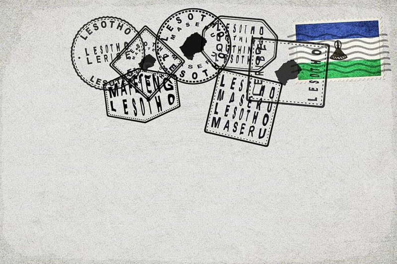 Lesotho Vintage Postcard with Flag Stamp and City Postmarks