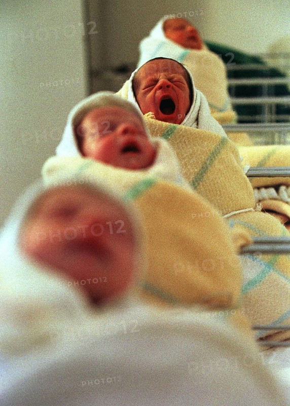 BIH, Sarajevo, 01.08.1995 -- SERIAL OF 10 PHOTOS -- Infants in a maternity hospital during the civil war in Sarajevo. (baby, toddler, screaming, crying) -- SARAJEVO BIRTH CLINIC DURING THE WAR IN 1995.   Bosnia Hercogovina, Eastern Europe