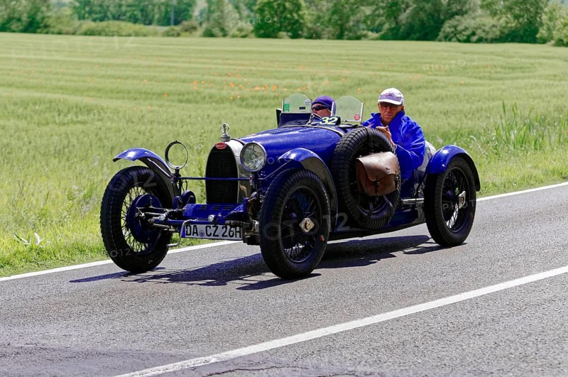 Blue vintage car with male occupants on rural road next to wheat fields, vintage car, car race, Mille Miglia, 1000 Miglia, 2015, Tuscany, Rome Lake Garda, Italy
