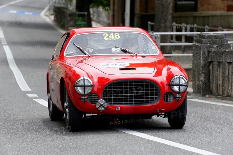 No. 248, Ferrari 225 S berinetta Vignale, built in 1952, A red classic car with a closed body drives down a road during a rally, Mille Miglia 2014 or 1000 Miglia, classic car race, San Marino, Italy