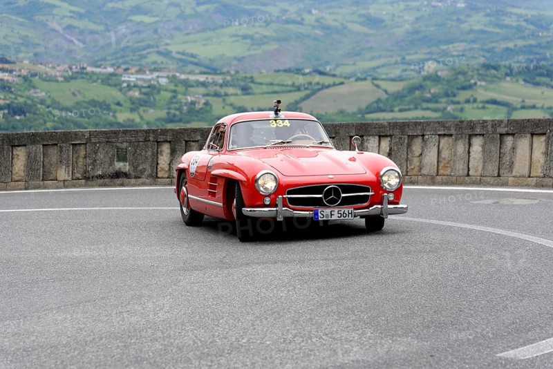 No. 334, Mercedes-Benz 300 SL W 198, model year 1955, Red Mercedes vintage car on a winding road in a hilly landscape, Mille Miglia 2014 or 1000 Miglia, vintage car race, San Marino, Italy
