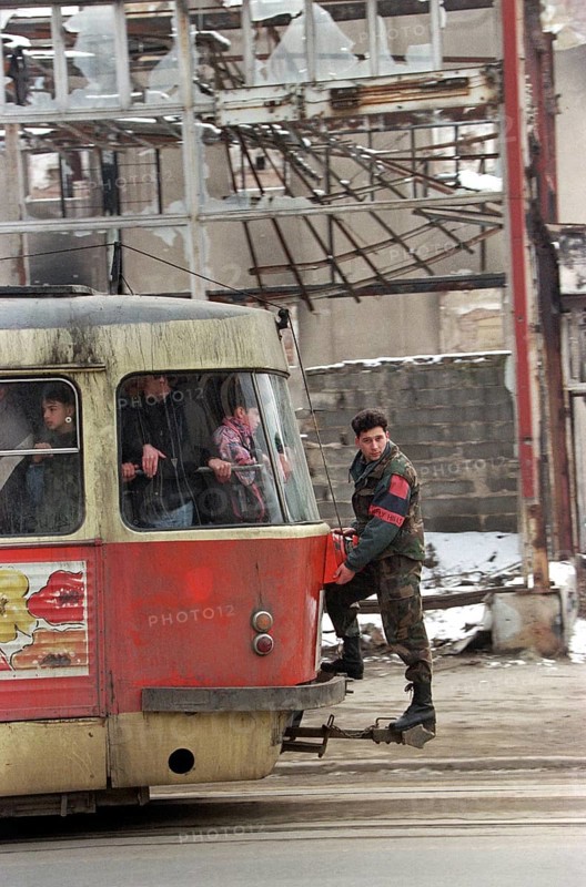 BIH, Bosnia, Sarajevo, 09.01.1996, man in uniform rides on tram