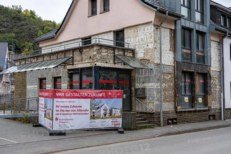 Reconstruction in the Ahr Valley, after the flood of July 2021, buildings that have not yet been renovated or demolished can be found in many towns, but most buildings have now been repaired or rebuilt, Sparkassen branch near Altenahr, Rhineland-Palatinate