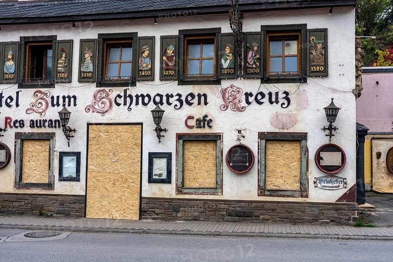Reconstruction in the Ahr Valley, after the flood of July 2021, buildings that have not yet been renovated or demolished can be found in many towns, but most buildings have now been repaired or rebuilt, Hotel Zum Schwarzen Kreuz near Altenahr, Rhineland-Palatinate