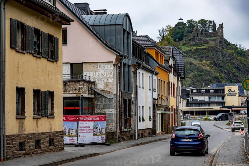 Reconstruction in the Ahr Valley, after the flood of July 2021, buildings that have not yet been renovated or demolished can be found in many towns, but most buildings have now been repaired or rebuilt, Sparkassen branch near Altenahr, Are Castle, Rhineland-Palatinate