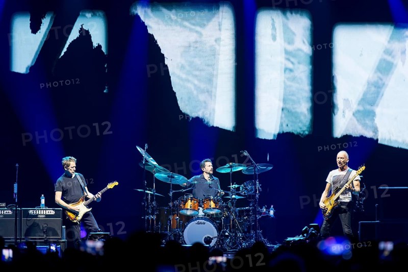 Dominic Miller (guitarist), Chris Maas (drummer), Sting (guitarist, real name: Gordon Matthew Thomas Sumner, CBE) live on Sting 3.0 tour at Berlin's Uber Arena on 16.10.2025