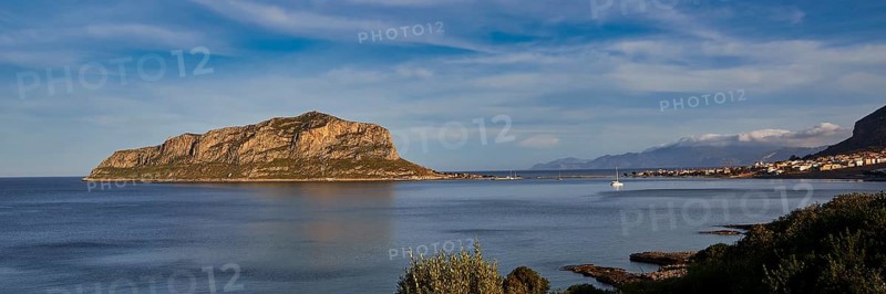 View of a large island in the sea under a clear blue sky, Monemvasia, Monemvassia, Malvasy, Byzantine small town, rocky island, fortress, Laconia, Peloponnese, peninsula, Greece