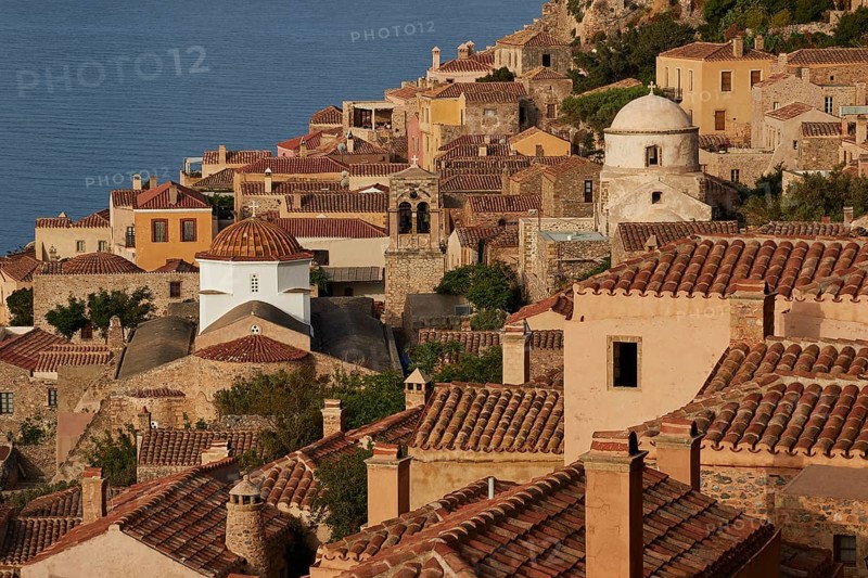 Soft morning light, Holy Church of the Virgin Mary Myrtidiotissa (or Critikias), Holy Church of Christ in Chains, Elkomenos Christos, view of a peaceful coastal town with churches and tiled roofs over the sea, Monemvasia, Monemvassia, Malvasy, small Byzantine town, rocky island, fortress, Laconia, Peloponnese, peninsula, Greece