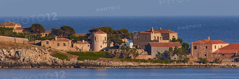 Coastal town with old stone buildings and tiled roofs by the sea, Monemvasia, Monemvassia, Malvasy, small Byzantine town, rocky island, fortress, Laconia, Peloponnese, peninsula, Greece