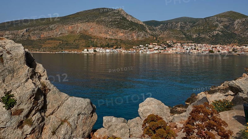 Quiet coastline with mountains in the background and a picturesque village, Monemvasia, Monemvassia, Malvasy, Byzantine small town, rocky island, fortress, Laconia, Peloponnese, peninsula, Greece