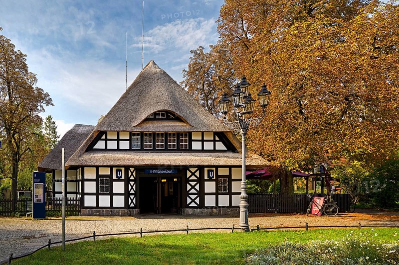 Entrance to Dahlem-Dorf subway station, thatched half-timbered house in the style of a North German manor house, Berlin-Dahlem, Berlin, Germany