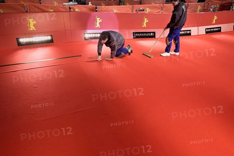 DEU, Germany, Berlin Workers lay the red carpet in front of the opening of the 61st Berlinale in front of the opening of the 61st Berlinale