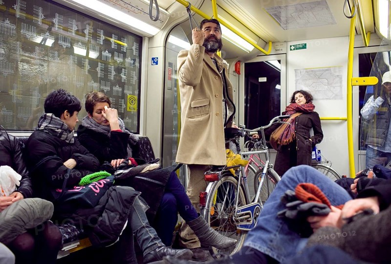 DEU Berlin passengers on the U8 towards Hermannplatz Saturday night. Germany Berlin Passengers Riding on a Tube on Saturday Night