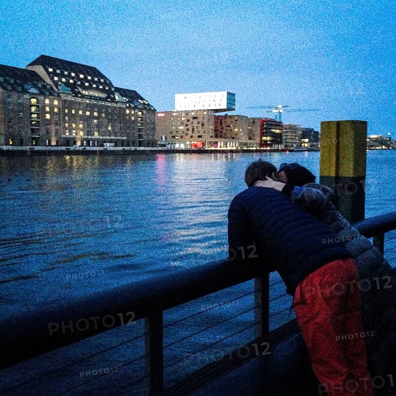 DEU Germany Germany Berlin A couple on the banks of Watergate, a club on the Oberbaum Bridge