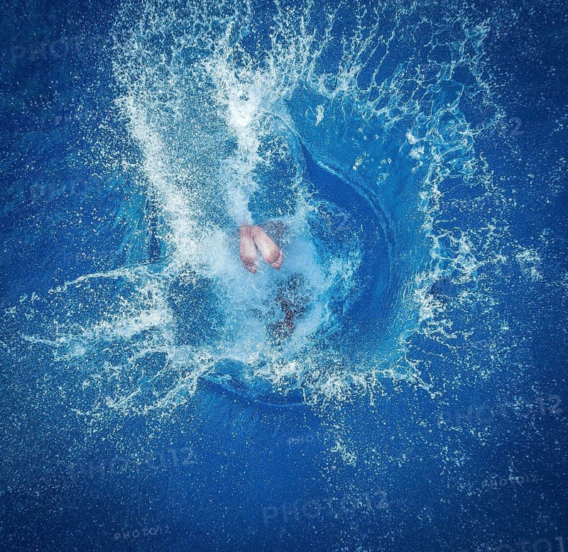 DEU Germany Germany Berlin Splashdiver Christian 'Elvis' Guth at his workplace in the Olympic swimming pool