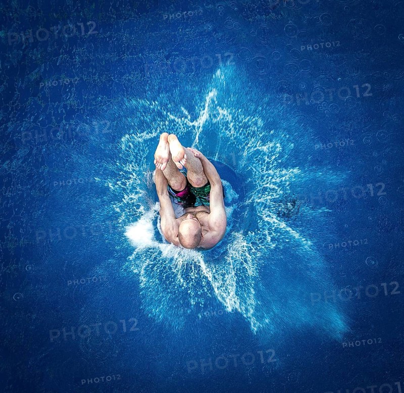 DEU Germany Germany Berlin Splashdiver Christian 'Elvis' Guth at his workplace in the Olympic swimming pool