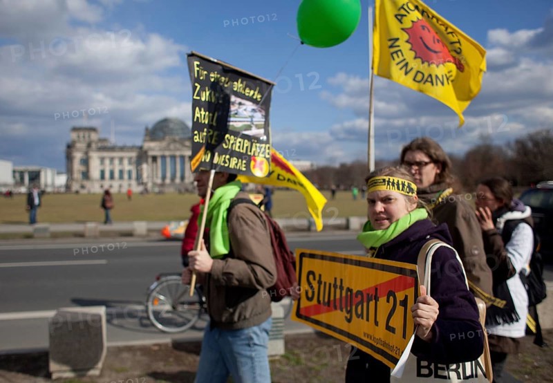Germany Berlin Anti-nuclear power demonstration in Berlin Mitte. Demonstrators pass through the Reichstag after a demonstration. Germany Berlin protest rally against nuclear power plants. Protesters passing the Reichstag after a demonstration