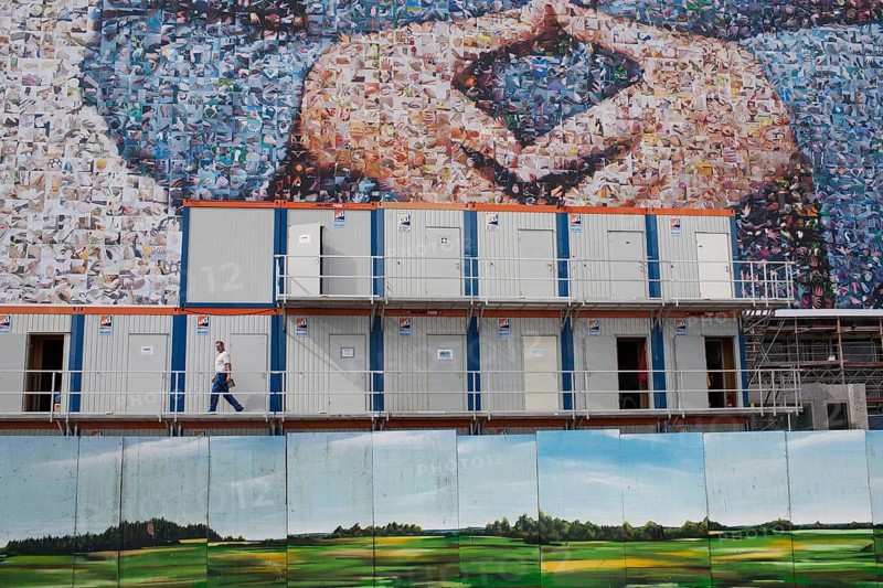DEU Germany Germany Berlin large poster with Angela Merkel's hands, Merkel diamond, on a building near the main train station