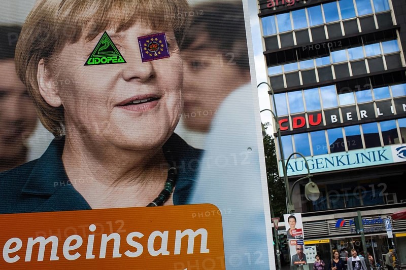 DEU Germany Germany Berlin Campaign poster by Federal Chancellor Angela Merkel near the CDU Berlin headquarters and an eye clinic