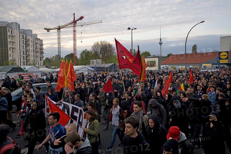 GERMANY May 1 rally passes a Lidl supermarket towards Moritzplatz Germany Berlin May Day protester passing a supermarket