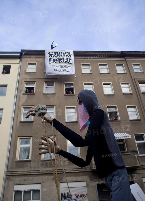 GERMANY Demonstrators march through Kreuzberg with a huge puppet during the May 1 rally. Germany Berlin Demonstrators with a Giant Puppet during the May Day Protest