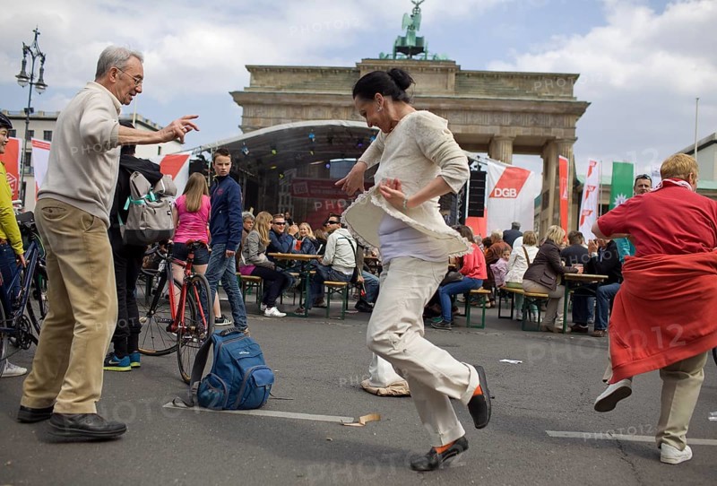 GERMANY Dancers at the DGB rally in front of the Brandenburg Gate Germany Berlin People dance in front of Brandenburg Gate during the May Day Protest of the German Unions