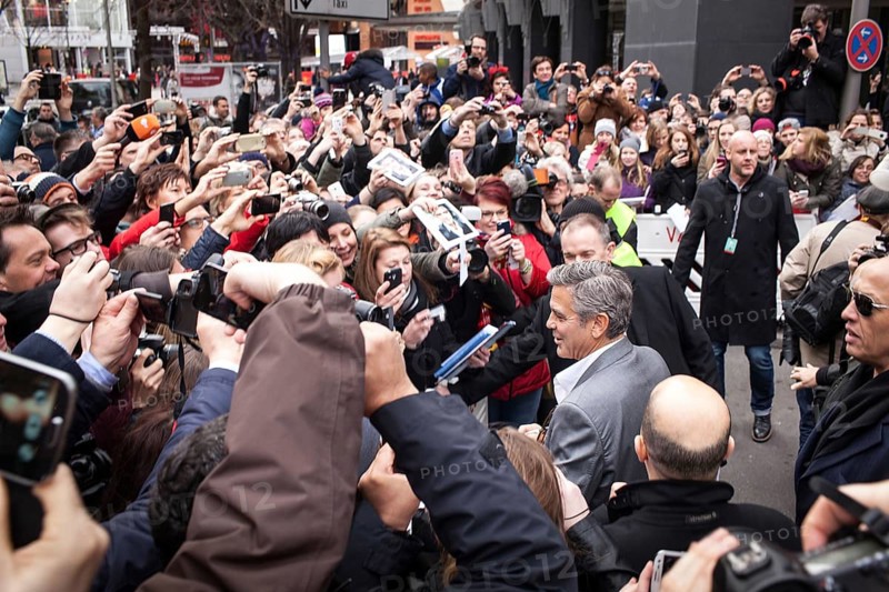 DEU Germany Germany Berlin 64th Berlinale, the international film festival in the German capital. The director of the films 'Monuments Men' George Clooney signs autographs