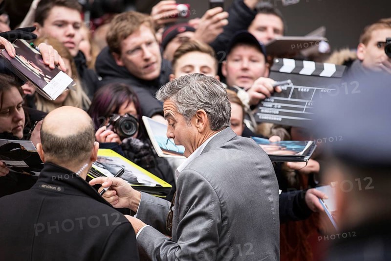 DEU Germany Germany Berlin 64th Berlinale, the international film festival in the German capital. The director of the films 'Monuments Men' George Clooney signs autographs