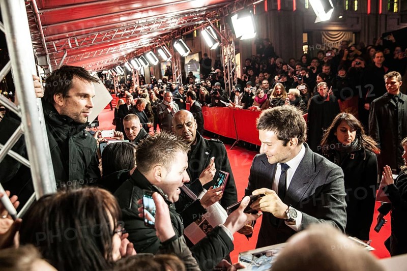DEU Germany Germany Berlin 64th Berlinale, the international film festival in the German capital. Film premiere in Friedrichsstadtpalast with Bradley Cooper, who took a photo of himself with a fan's smartphone
