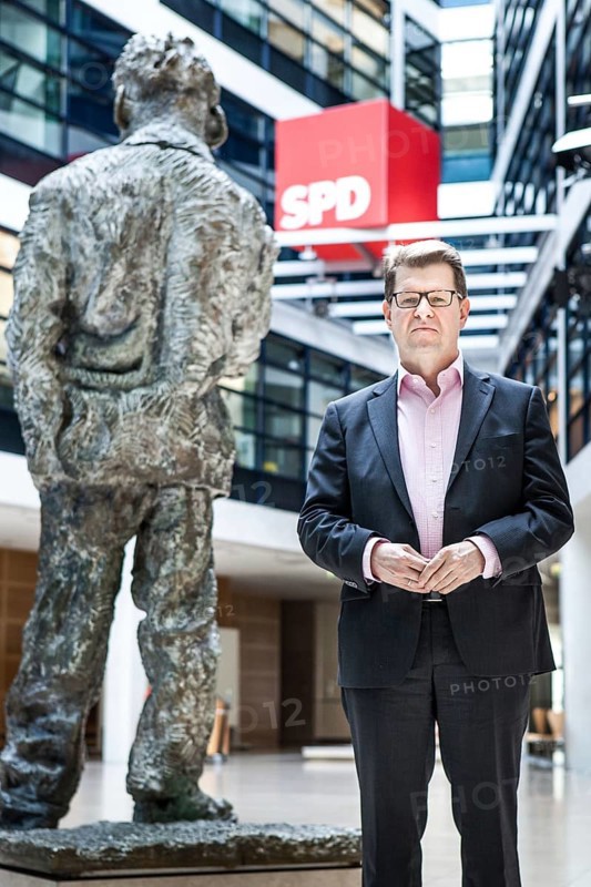 DEU Germany Germany Berlin SPD party vice Ralf Stegner poses with the Willy Brandt memorial at the SPD party headquarters