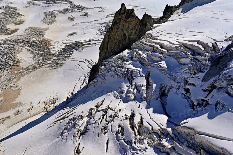 View from the Télécabine Panorama Railway of the glacial crevices of the Glacier du Géant, Chamonix-Mont-Blanc, Haute-Savoie, France