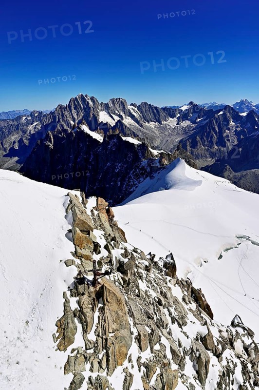 View from the Aiguille du Midi mountain station observation deck of the mountains Aiguille Vert, Les Droites, Les Courtes, Chamonix-Mont-Blanc, Haute-Savoie, France