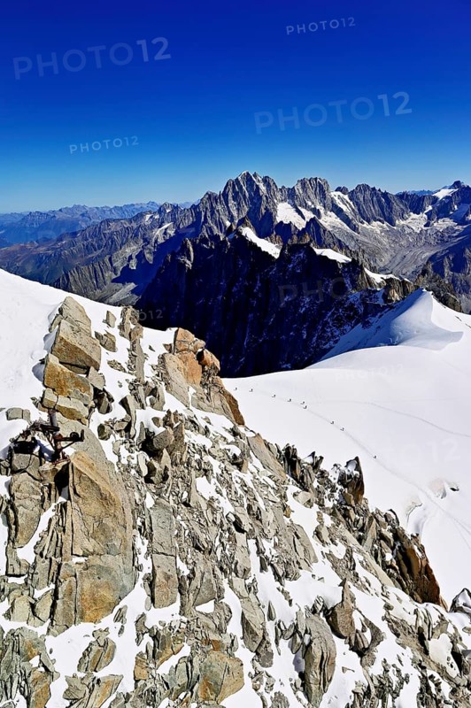 View from the Aiguille du Midi mountain station observation deck of the mountains Aiguille Vert, Les Droites, Les Courtes, Chamonix-Mont-Blanc, Haute-Savoie, France