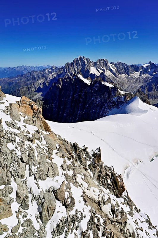 View from the Aiguille du Midi mountain station observation deck of the mountains Aiguille Vert, Les Droites, Les Courtes, Chamonix-Mont-Blanc, Haute-Savoie, France