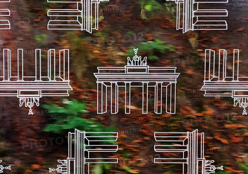 Subway window covered with Brandenburg Gate pattern film to protect against scratching while driving, Berlin, Germany