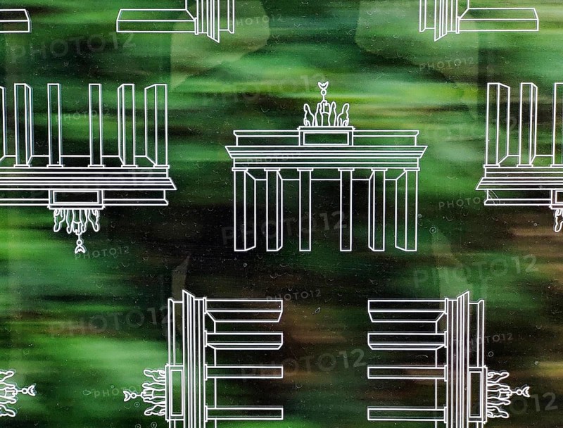 Subway window covered with Brandenburg Gate pattern film to protect against scratching while driving, Berlin, Germany