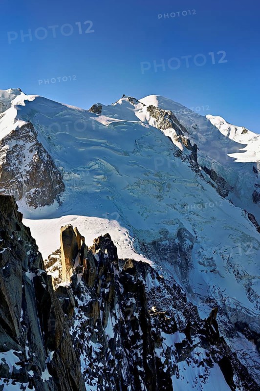 Mont Blanc du Tacul covered with snow from the left, Mont Maudit, Mont-Blanc, Aiguille du Midi mountain station viewing platform, Chamonix-Mont-Blanc, Haute-Savoie, France