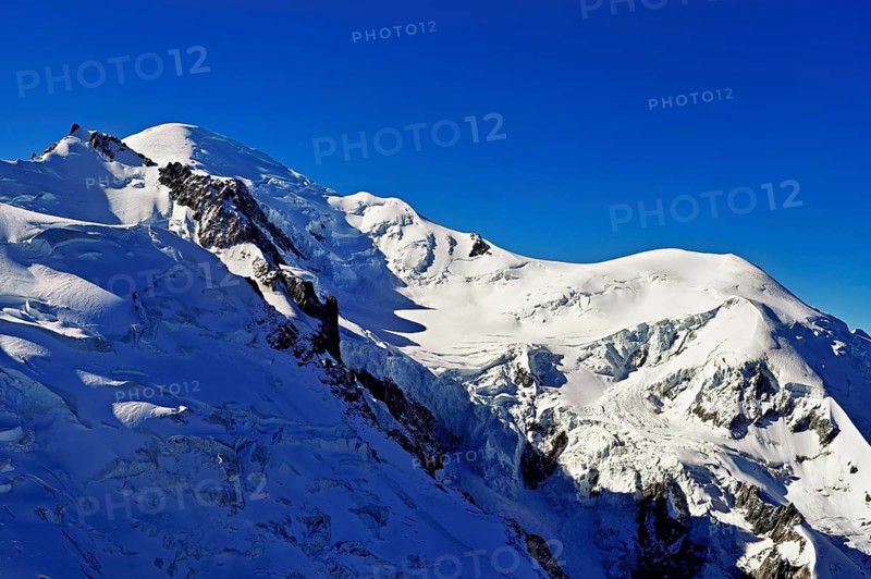 Mont Maudit covered with snow from the left, Mont-Blanc, Dôme du Goûter, Aiguille du Midi mountain station viewing platform, Chamonix-Mont-Blanc, Haute-Savoie, France