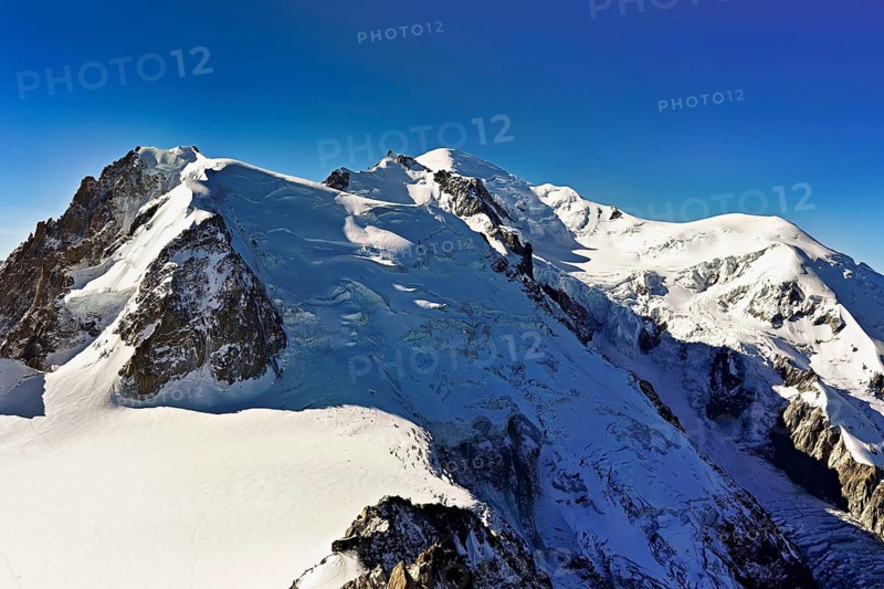 Mont Blanc du Tacul covered with snow from the left, Mont Maudit, Mont-Blanc, Dôme du Goûter, Aiguille du Midi mountain station viewing platform, Chamonix-Mont-Blanc, Haute-Savoie, France